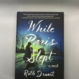 While Paris Slept: A Novel by Ruth Druart